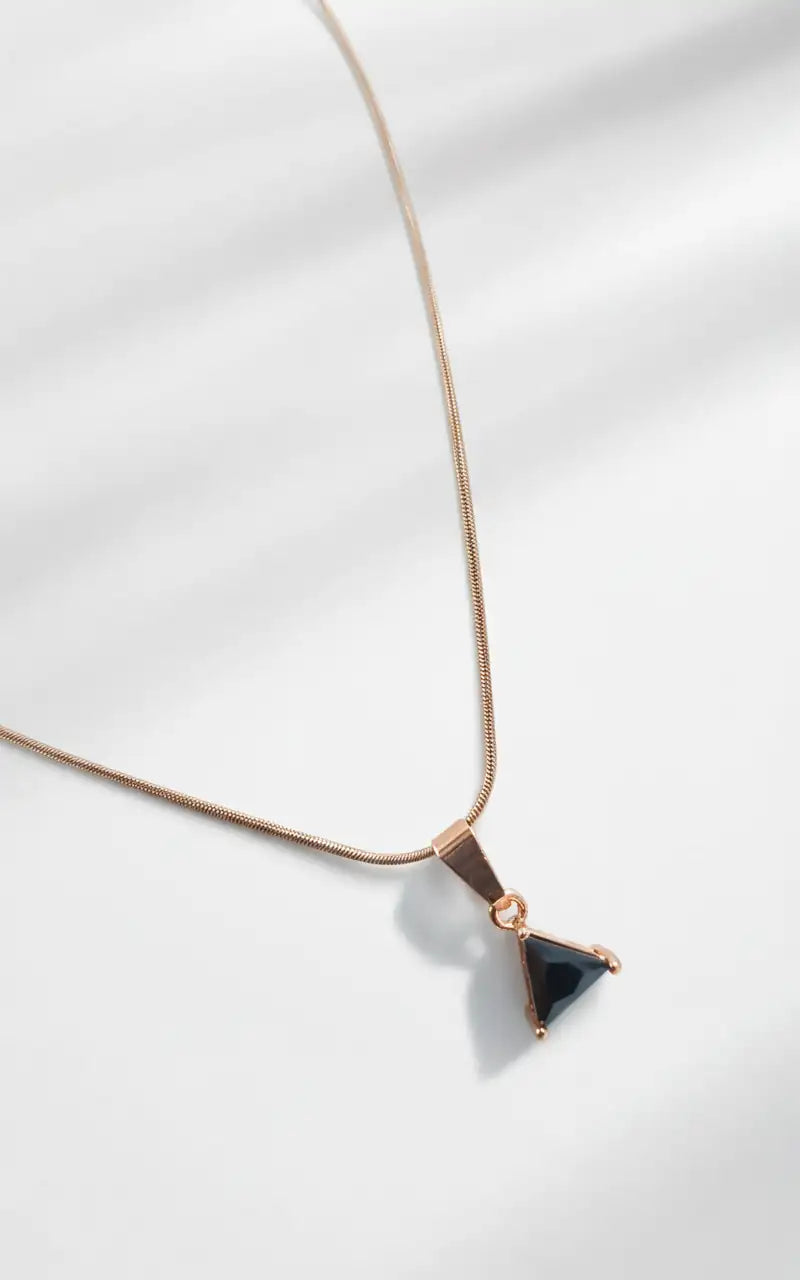 Trikona Noir Triangle Pendant Necklace – Rose Gold-Plated Snake Chain