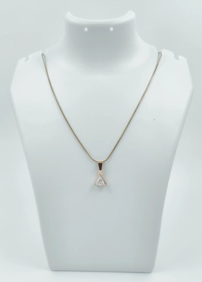 Necklace with a pendant on a mannequin bust against a white background