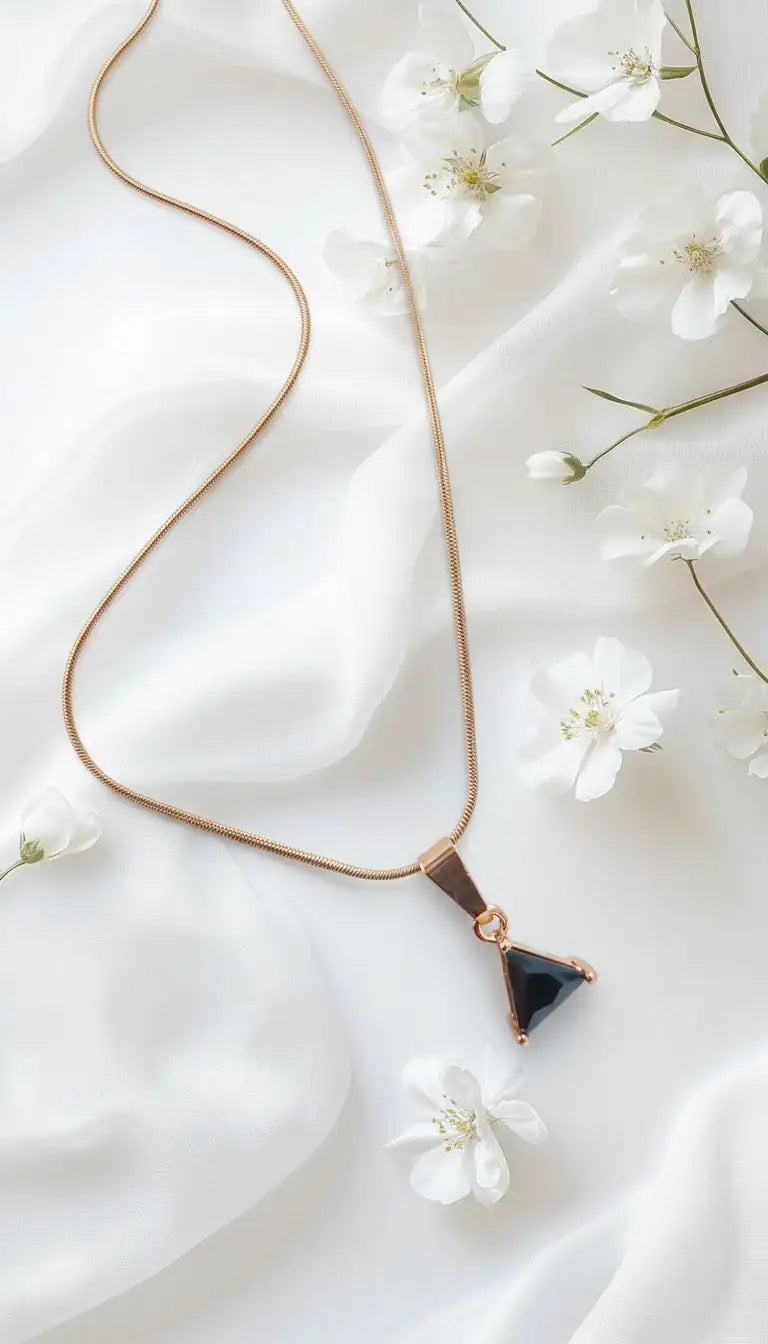 Trikona Noir Triangle Pendant Necklace – Rose Gold-Plated Snake Chain